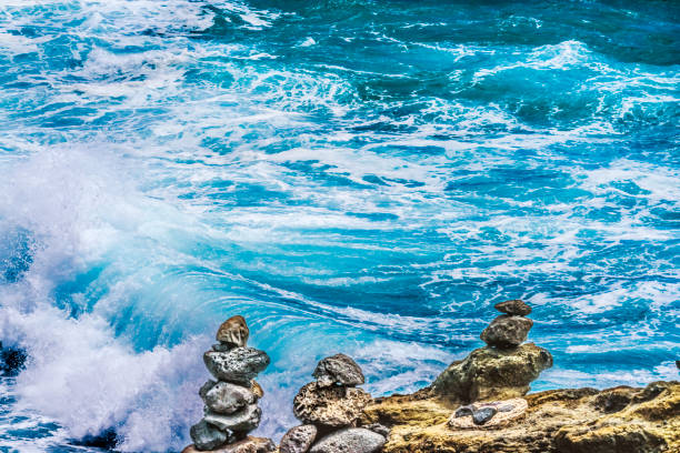 Colorful Cairns Rock Piles Ocean Honolulu Oahu  Hawaii Cairns symbolize trails