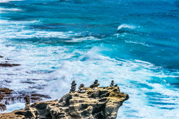 istock Colorful Cairns Rock Piles Ocean Honolulu Hawaii 1442428135