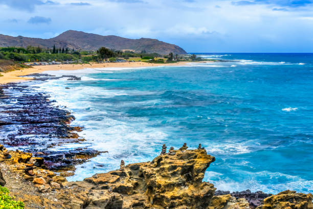 istock Colorful Cairns Rock Piles Ocean Sandy Beach Honolulu Hawaii 1442428144