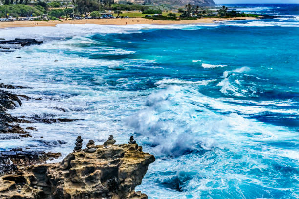 Colorful Cairns Rock Piles Ocean Sandy Beach Honolulu Oahu  Hawaii Cairns symbolize trails Sandy one of best body surfing beaches on Oahu