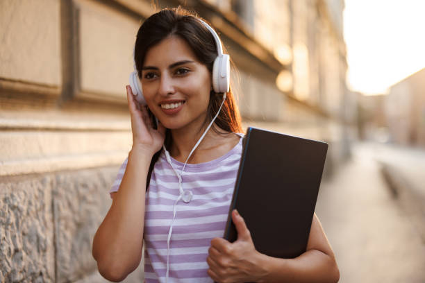 istock Enjoying good music while walking in the city 1442429281