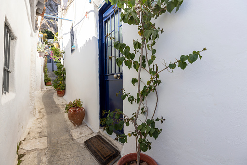Anafiotika, scenic tiny neighborhood of Athens, part of the old historical district Plaka, narrow streets, Athens, Greece. It is traditional village located at the foot of the Acropolis