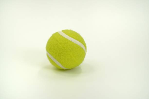 istock An image showing a tennis ball on a white background, isolated. 1442431342