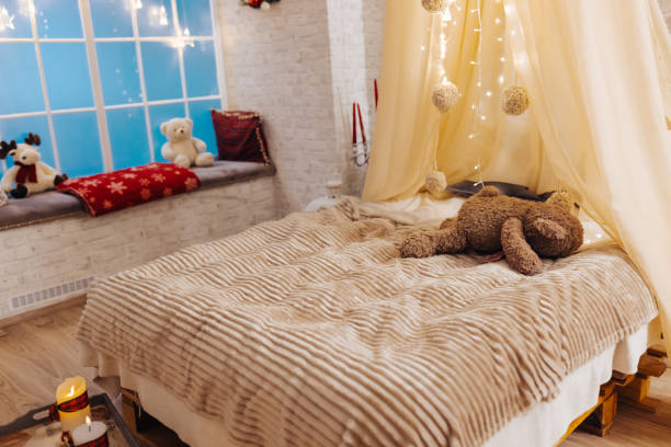 istock Christmas decorated bedroom without people 1442436303