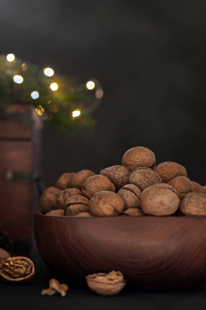 In a wooden bowl on a black background