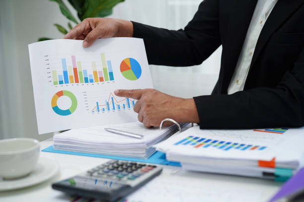istock Business woman working and analysis with statistic graph in office. 1442439801