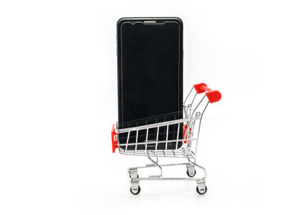 istock Shopping online eCommerce smartphone in cart. 1442440703
