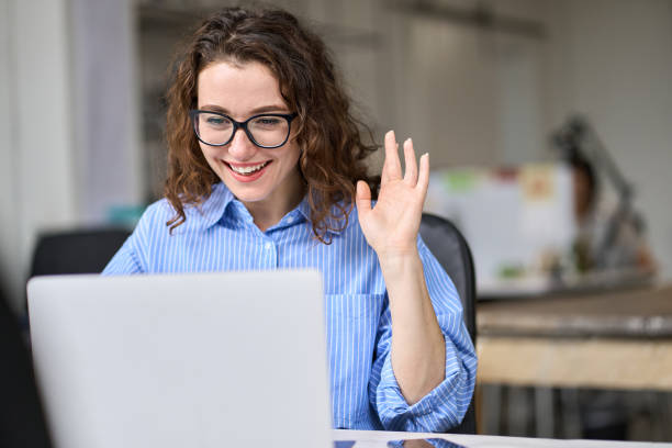 istock Happy business woman using laptop for remote virtual work conference meeting. 1442441951