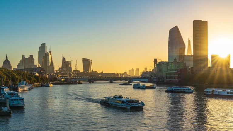 Night to day Time lapse of Financial glass office building riverbank with The Shard London bridge area at sunrise time in high street London