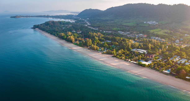 aerial view of long beach at sunset, in koh lanta, krabi, thailand - length south high up climate imagens e fotografias de stock