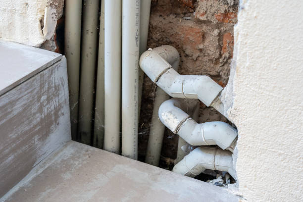istock Pipes in a wall. Unfinished repair. Maintenance 1442450243