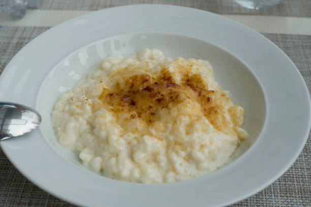 istock Creamy rice pudding with cinnamon. A simple, nutritious dessert made from rice, milk, eggs, vanilla and sugar. 1442451125