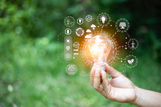 istock green energy concept help reduce global warming.
Hand holding natural background light bulb on green leaf with clean energy icon around it. Carbon dioxide emission in industry zero carbon concept. 1442454400