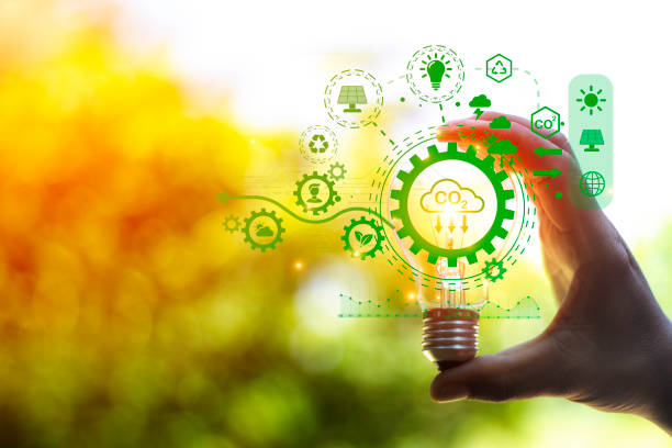 istock green energy concept help reduce global warming.
Hand holding natural background light bulb on green leaf with clean energy icon around it. Carbon dioxide emission in industry zero carbon concept. 1442455206