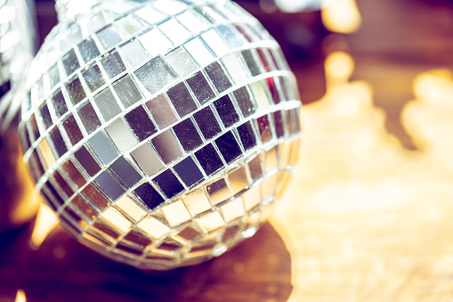 Sparkling disco ball in a day light. Concept of party.