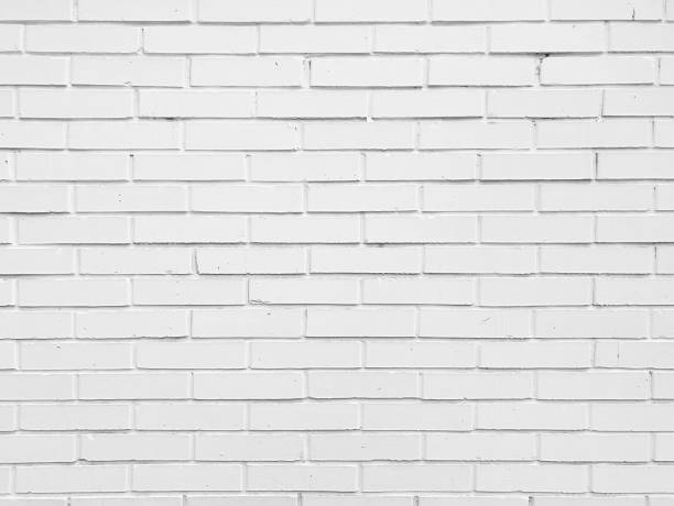 istock Old bright white brick tiles wall textured background. Kitchen wallpaper concept. 1442472665