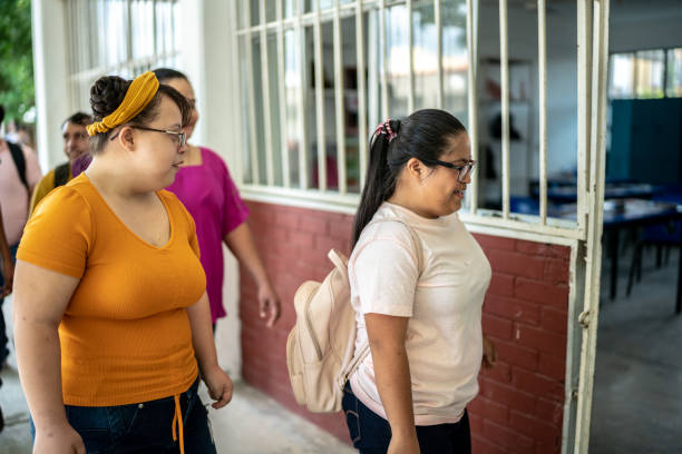 istock Special needs students arriving in the classroom at school 1442474151