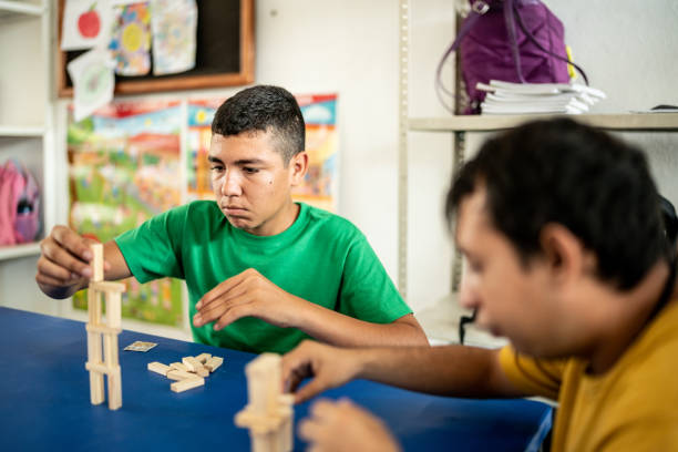 istock Psychomotor Intellectual disability students playing with didactic toys in the classroom at school 1442476297