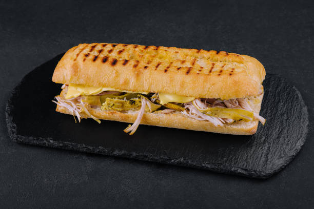 istock Big sandwich with chicken on stone board 1442476611