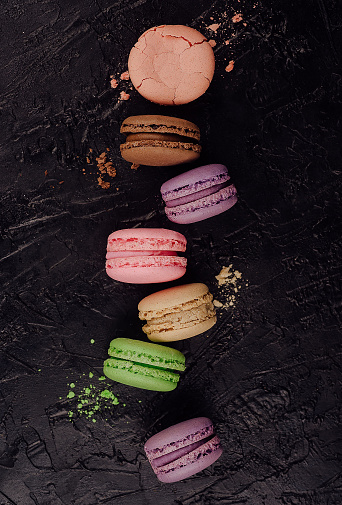 Variety of french dessert macaroons on top view