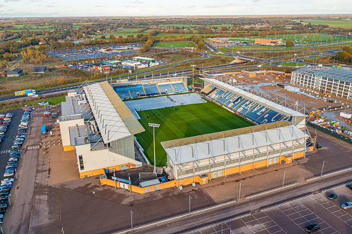 Aerial photo of Colchester F.C's stadium in Colchester, Essex, UK. It has a capacity of 10,105 and opened in August 2008 in time for the 2008–09 season. This photo was captured in November 2022.