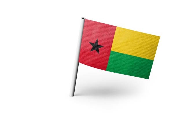flagge von guinea-bissau angeheftet. weißer hintergrund - guinea bissau flag stock-fotos und bilder