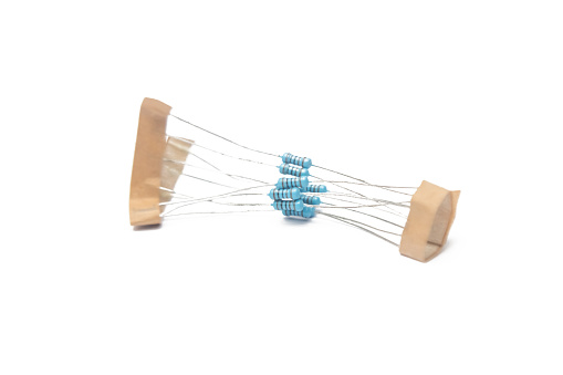 Close-up view of the same color coded blue resistor group on a white background.