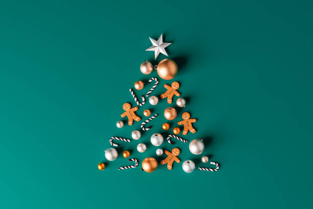 Christmas tree composition with baubles and cookies stock photo