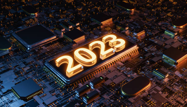 3d rendering of a new year 2023 illuminated sign on a futuristic motherboard microchip stock photo