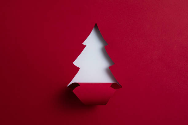 Christmas Tree Made of Paper for Winter Holidays Concept stock photo