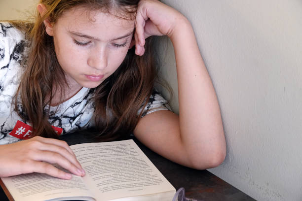 istock Young School Girl Studying her Lesson 1442482815