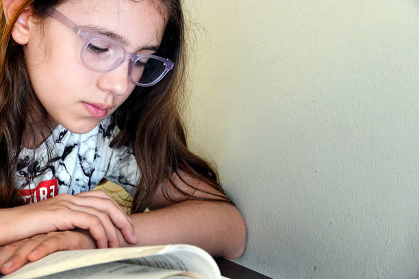 istock Young School Girl Studying her Lesson 1442482832