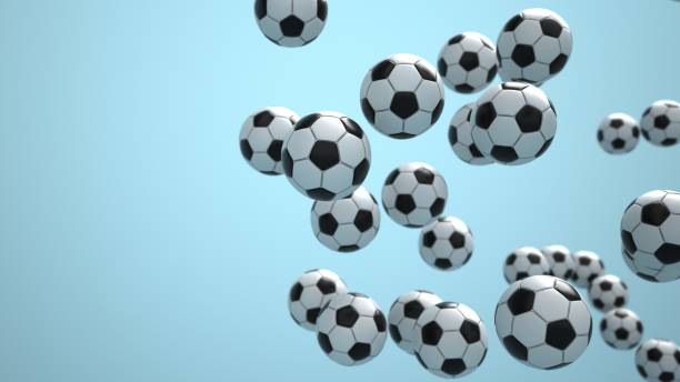 istock Flying Footballs Blue Background 1442483140