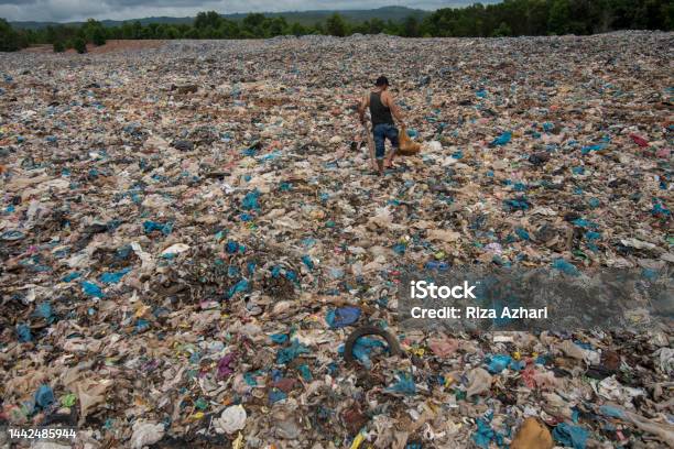 Garbage In Landfills Stock Photo - Download Image Now - Pollution, Sea, Plastic