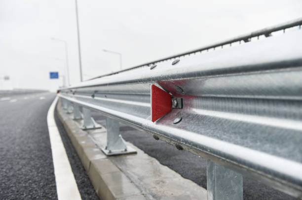Metallic road barrier for traffic safety on a new constructed road stock photo