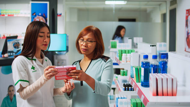 istock Asian people analyzing cardiology medicine with customer 1442487378