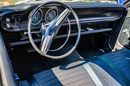 Des Moines, IA - July 03, 2022: High perspective detail interior view of a 1970 Ford Maverick 2 Door Hardtop at a local car show.