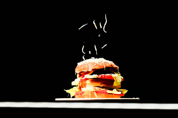 istock Fresh tasty burger isolated on black background 1442489337