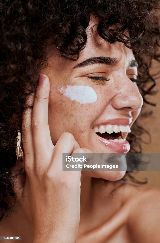 Happy woman, face cream and beauty, makeup product and sunscreen facial treatment for aesthetic shine. Young model, face freckles and body lotion, cosmetics and healthy skincare, wellness and melasma Skin Care Stock Photo