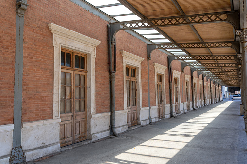 Spanish railway station walkway facade