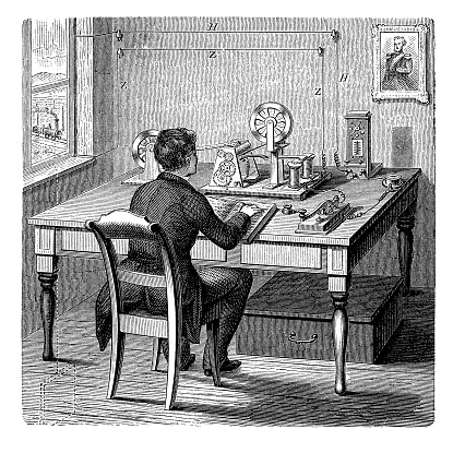 Vintage technology: Morse telegraph office station, employee working with the code