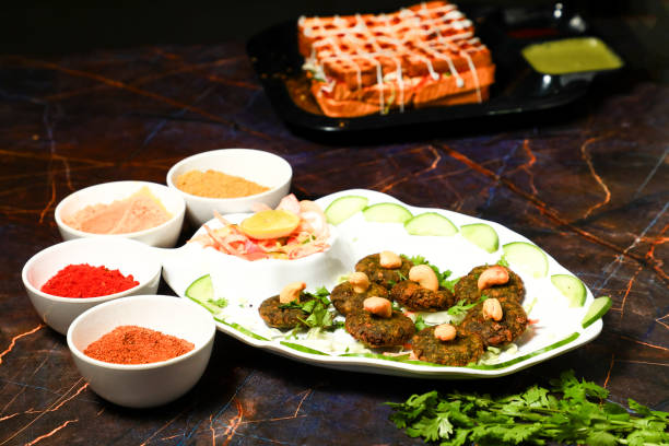 istock Indian Side Dish Popular Chaat Snacks Aaloo Aalu Mashed Boiled Potato Tikki With Spicy Green Chutney And Tomato Sauce 1442491415