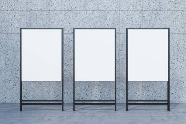 istock Blank white banners on concrete wall background. Billboard, exhibition and mock up concept. 3D Rendering. 1442495201