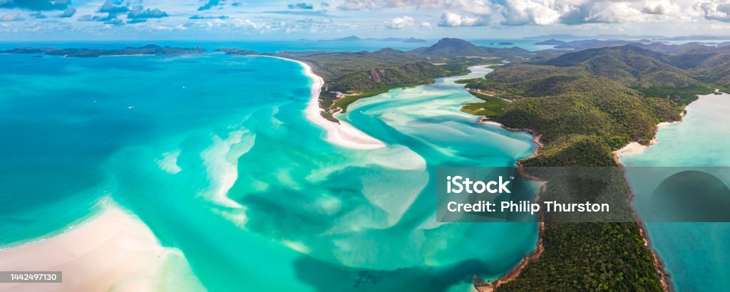 Panorama of Hill Inlet on a sunny day in Whitsundays Island in Great Barrier Reef, Australia Great Barrier Reef Stock Photo