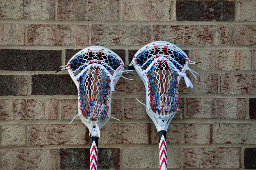 Red, white, and blue mens lacrosse stick