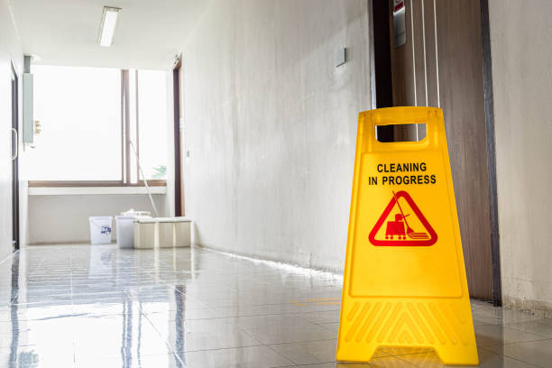 istock Close up yellow warning sign with message Cleaning in progress 1442505987