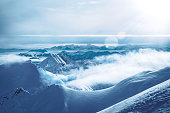 Wild and untouched snowy mountain landscape in breathtaking winter atmosphere photographed in Mölltal Glacier ski resort. Mölltaler glacier, Flattach, Kärnten, Austria, Europe.