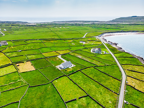 Aerial view of Inishmore or Inis Mor, the largest of the Aran Islands in Galway Bay, Ireland. Famous for its strong Irish culture, loyalty to the Irish language, and a wealth of ancient sites.