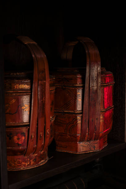 istock Ancient Chinese bamboo basket container antique for food in dark shelf 1442510380