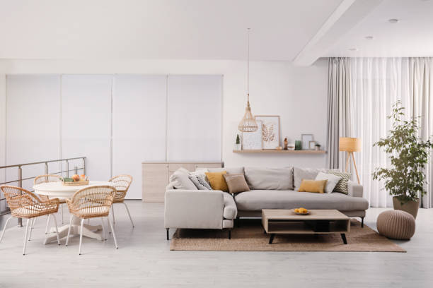 istock Stylish living room interior with comfortable grey sofa and coffee table 1442514971